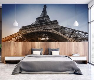 resting under the cult tower eiffel tower wallpaper mural photo wallpapers demural